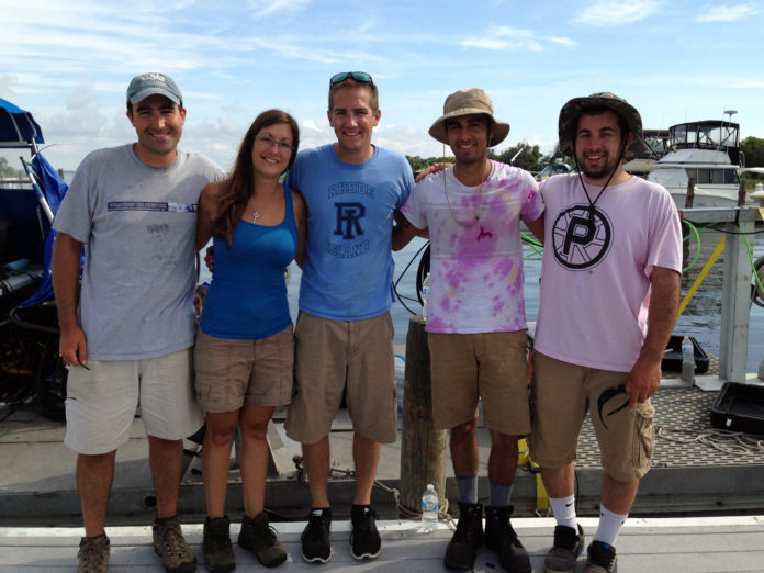 UNIVERSITY OF Rhode Island doctoral students, from left to right, who are involved in the ocean floor mapping project: Casey Hearn, Monique LaFrance Bartley, Sean Scannell, Nicholas Englehart and Mitchell Kennedy. Scannell graduated this year with a marine affairs degree from URI; Englehart and Kennedy earned degrees in geological oceanography. Hearn and Bartley are Graduate School of Oceanography doctoral students. / COURTESY MONIQUE LAFRANCE BARTLEY