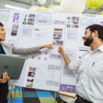BETTER OUTCOME, LOWER COST: Michelle Wu, Ximedica vice president of quality, and Bradley Codkind, design insurance engineer, discuss a project at the company's Providence headquarters. / PBN PHOTO/RUPERT WHITELEY