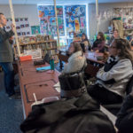Highlander bets on tech-learning blend A WHOLE NEW WORLD: Highlander Institute is dedicated to spreading innovation to transform education. Here, left, Eric Butash, director of operations for the nonprofit, discusses smartphone potential with staff at Central Elementary School in Lincoln. / PBN PHOTO/MICHAEL SALERNO
