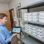 Keeping track when it matters most IN THE KNOW: A2B Tracking Solutions founder, CEO and President Peter M. Collins has built a company that uses bar codes and digital technology to help the U.S. military and civilian clients keep track of millions of assets from its Portsmouth home. / PBN PHOTO/MICHAEL SALERNO