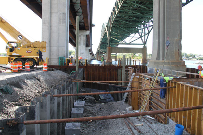 THE R.I. DEPARTMENT of Transportation has received six bids for demolition of the old Sakonnet River Bridge, seen on the right, and anticipates awarding a contract this winter. / COURTESY RIDOT/CHUCK AUBE