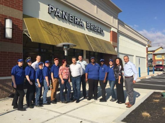 WELL-TRAINED: During training at a new Panera Bread location in South Windsor, Conn., franchisee Bahjat Shariff, far right, instructs trainees on the importance of making guests comfortable. / COURTESY HOWLEY BREAD GROUP