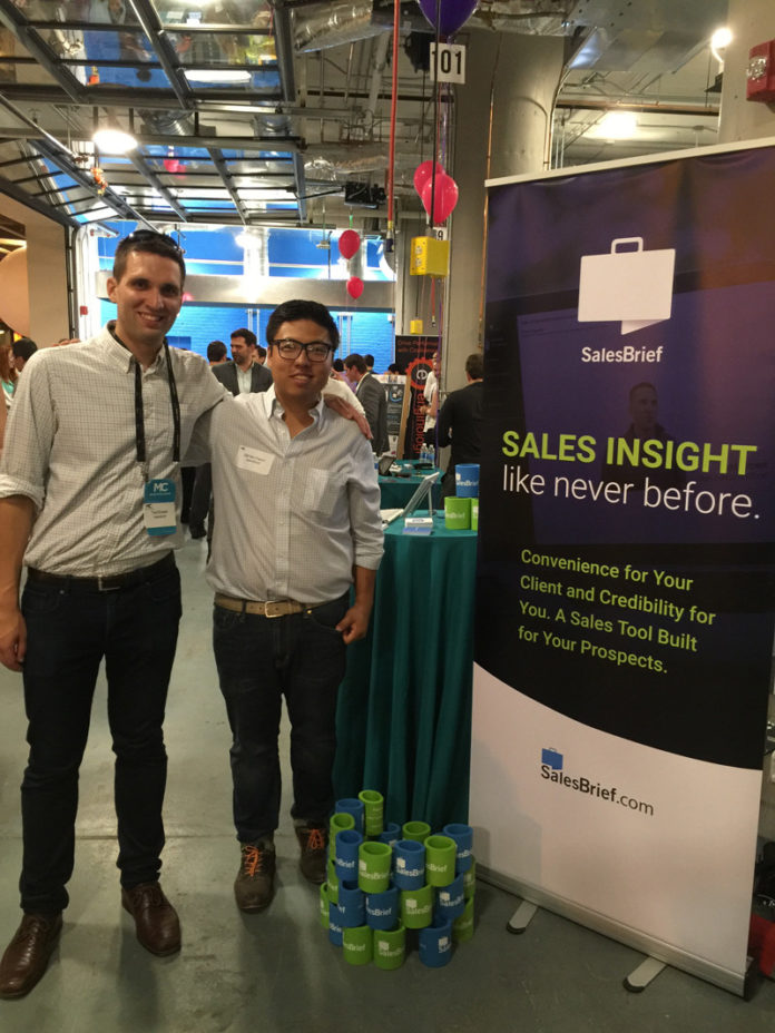 NEW INSIGHT: SalesBrief co-founder and CEO Ted Brown, left, and Chief Marketing Officer James Kwon, at a MassChallenge accelerator event in Boston. The Pawtucket-based tech company offers business-to-business services. / COURTESY SALESBRIEF