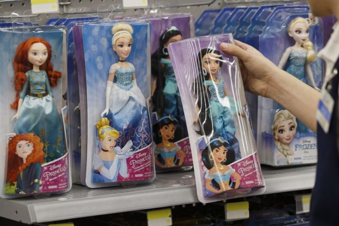 DISNEY PRINCESS dolls are shown for sale. Frozen, in particular, was a winner on store shelves. / BLOOMBERG NEWS PHOTO