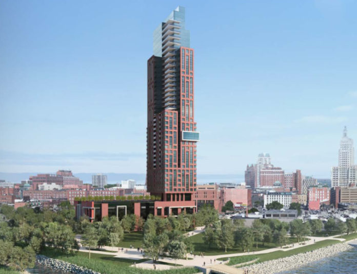 A developer who has proposed a trio of modern skyscrapers for vacant land in the I-195 Redevelopment District said Thursday he is ready to move forward on one of the towers immediately, and reiterated his intention to build in phases. Pictured is the first tower slated for development, a 43-floor high-rise. / COURTESY THE FANE ORGANIZATION