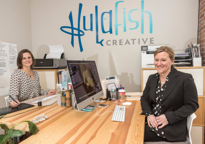 DESIGN DUO: From left, Jamie Sharp, graphic designer, and Jennifer Giardino, marketing strategist, owners of Hulafish Creative in North Kingstown, which creates marketing campaigns and logos. / PBN PHOTO/ MICHAEL SALERNO DESIGN DUO: From left, Jamie Sharp, graphic designer, and Jennifer Giardino, marketing strategist, owners of Hulafish Creative in North Kingstown, which creates marketing campaigns and logos. / PBN PHOTO/ MICHAEL SALERNO