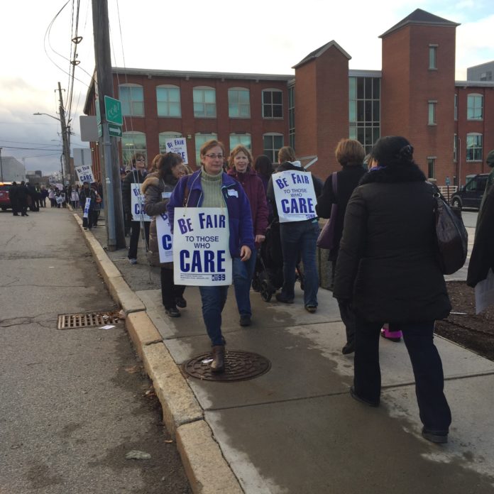 WOMEN & INFANTS HOSPITAL employees picket outside of Care New England corporate offices on Dec. 7. / PBN PHOTO/NANCY KIRSCH