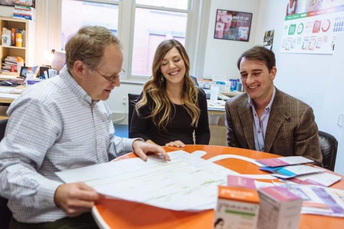STARTUP  SUCCESS: From left, Luna Pharmaceuticals staff: Jamie Schapiro, chief marketing officer; Megan Bell, marketing and sales manager; and Dan Aziz, CEO and founder. Started in 2011 by Aziz, Luna is a Providence startup success story. / PBN PHOTO/ RUPERT WHITELEY
