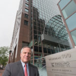 JOSEPH R. Paolino Jr., is shown in front of Paolino headquarters at 100 Westminster St. in Providence. He said he bought the former St. Joseph's hospital building and plans to convert it into housing for the homeless.  / PBN FILE PHOTO/MICHAEL SALERNO