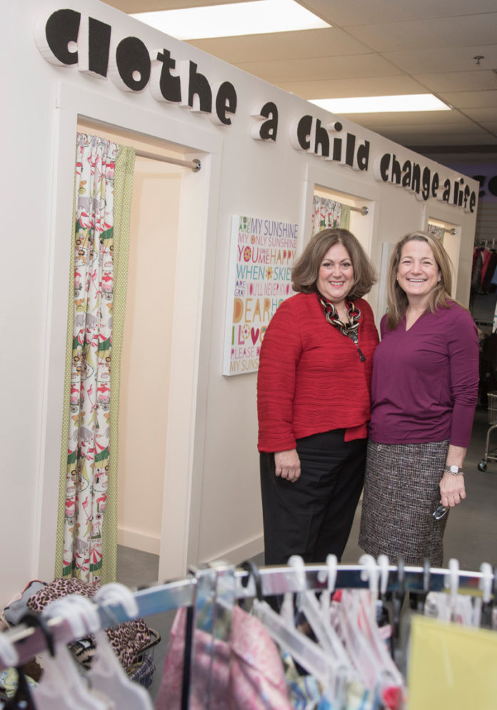 GIVING BACK: Co-founded by Eva-Marie Mancuso, left, and Marianne M. Baldwin, Clothes to Kids Rhode Island is a nonprofit that collects new and gently used clothing for children in Providence County schools. / PBN PHOTO/MICHAEL SALERNO
