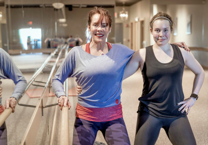 FAMILY BUSINESS: Pure Barre owners Leslie Sweeney, left, and her daughter Jaime in their Cranston studio. / PBN PHOTO/MICHAEL SALERNO
