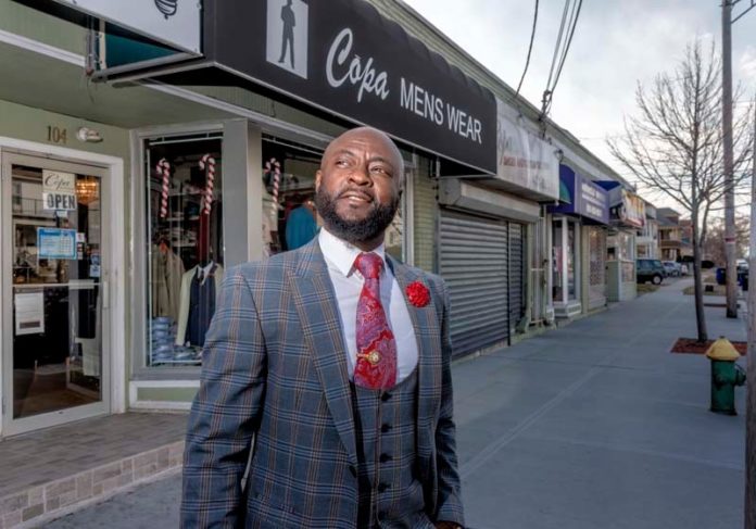 SEEKING SUPPORT: Frank Ankoma, owner of Copa Menswear in Providence, would like to see the city offer lower interest rates on small-business loans and programs to teach immigrants how to be successful business owners. / PBN PHOTO/MICHAEL SALERNO SEEKING SUPPORT: Frank Ankoma, owner of Copa Menswear in Providence, would like to see the city offer lower interest rates on small-business loans and programs to teach immigrants how to be successful business owners. / PBN PHOTO/MICHAEL SALERNO