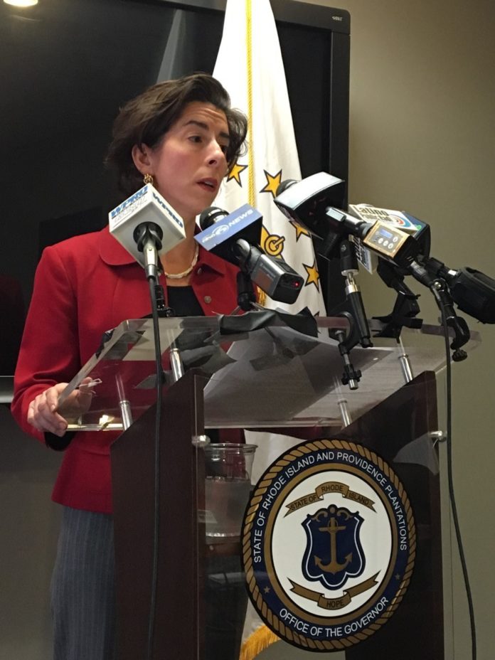GOV. GINA M. Raimondo speaks at a press conference Jan. 12 about personnel changes after the botched rollout of the state’s new health and human services eligibility computer system, known as UHIP. / PBN PHOTO/EMILY GOWDEY-BACKUS