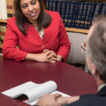 5Q: Neena S. Savage PREPARED: Neena S. Savage, tax administrator, R.I. Division of Taxation, speaks with R.I. Department of Revenue spokesman Paul Grimaldi. / PBN PHOTO/MICHAEL SALERNO