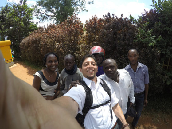 INNOVATIVE SOLUTION: Nuway co-founder Ayan Bhandari, center, snaps a selfie with motorcycle-taxi drivers in Uganda. Nuway is designing a safety bar to help prevent people from falling off while riding motorcycle taxis. / COURTESY AYAN BHANDARI