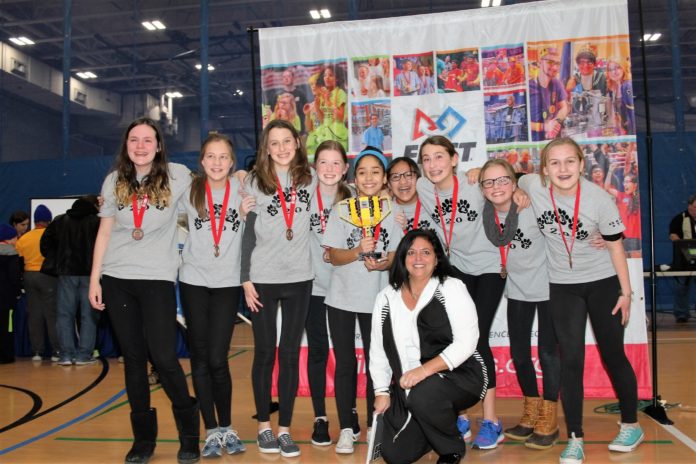 WINNERS OF S.M.A.R.T. 2.0, a robotics team from St. Mary Academy Bay View, rejoice at the recent FIRST LEGO robotics tournament held at Roger Williams University in Bristol. From left, Isabella Heffernan, Lucy Bosch, Maeve Martineau, Ainsley Pattie, Eva Mattos, Ava Troino, Gabriella Osorio-Palo, Margaret Mahoney and Wren Hager, with Coach Linda Grasso. / COURTESY BAY VIEW