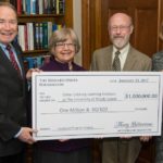 FROM LEFT TO RIGHT, University of Rhode Island President David Dooley, URI Institute Executive Director Beth Leconte, URI Professor Phillip G. Clark and URI Foundation President Lil Breul O&rsquo;Rourke are shown with the check from The Bernard Osher Foundation for $1 million. / COURTESY UNIVERSITY OF RHODE ISLAND