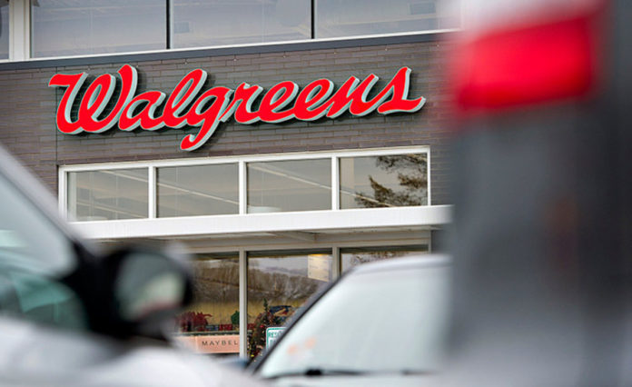 WALGREENS BOOTS Alliance Inc. and Rite Aid Corp.’s giant drugstore merger got smaller Monday after the companies cut the value of the deal by at least $2 billion and said they may divest more stores to gain approval. / BLOOMBERG NEWS PHOTO