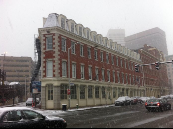 SNOW FALLS in downtown Providence Tuesday afternoon. The National Weather Service has issued a winter weather advisory until 4 a.m. Wednesday. / PBN PHOTO/MARY MACDONALD