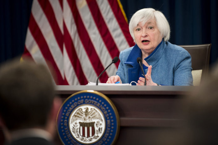 IN PREPARED REMARKS to the Senate Banking Committee, Federal Reserve Chair Janet Yellen re-affirmed the central bank's commitment to raising interest rates if the economy meets expectations with regard to inflation and the labor markets. / BLOOMBERG NEWS FILE PHOTO/PETE MAROVICH