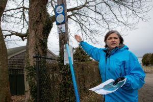 CLIMATE EFFECT: Teresa Crean, community planner with the Coastal Resources Center at the University of Rhode Island, talks about the impacts of flooding and climate change on the homes in The Point section of Newport. / PBN PHOTO/KATE WHITNEY LUCEY