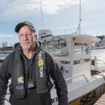 SEA CAPTAIN: Sea Tow owner Kevin Scott at Allen Harbor Marina in North Kingstown. / PBN PHOTO/MICHAEL SALERNO