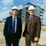 ADDED SERVICES: University Orthopedics is building a new facility in East Providence to expand services. CEO Weber Shill, left, visits the site with Michael Integlia, president and CEO of Michael Integlia & Co., construction manager for the project. / PBN PHOTO/RUPERT WHITELEY
