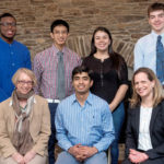 UNIVERSITY OF Rhode Island engineering students, back row, from left, Corvah Akoiwala, Cristian Witcher, Laura Parra and James Gannon, will travel to Colombia this summer with prosthetic arms and hands they have made for amputees. The project is funded by a federal grant from the &ldquo;100,000 Strong in the Americas&rdquo; program. In the front row are, from left, Sigrid Berka, director of the International Engineering Program at URI; Kunal Mankodiya, assistant professor of biomedical engineering at URI; and Silke Scholz, director of the Spanish International Engineering Program at URI. / COURTESY UNIVERSITY OF RHODE ISLAND/MICHAEL SALERNO