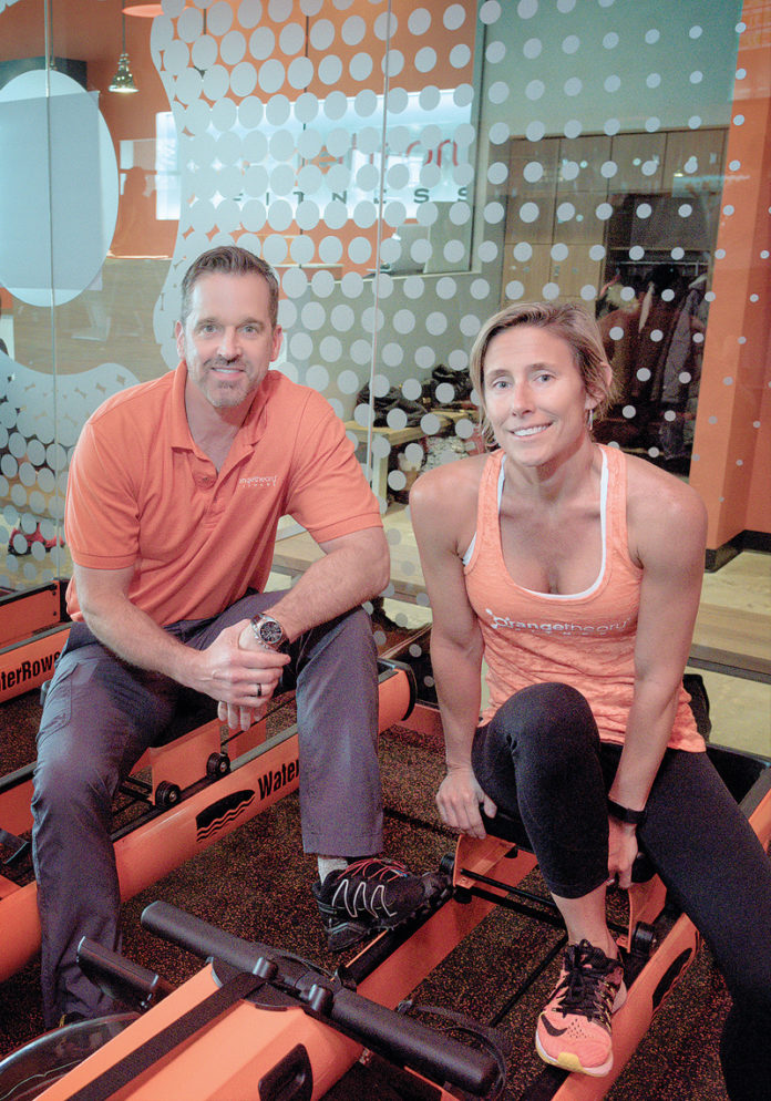 FITNESS VETERAN: Jay Wagnon, area developer, and Lori Snietka, director of sales and operations, at Orangetheory Fitness in Cranston. / PBN PHOTO/MICHAEL SALERNO FITNESS VETERAN: Jay Wagnon, area developer, and Lori Snietka, director of sales and operations, at Orangetheory Fitness in Cranston. / PBN PHOTO/MICHAEL SALERNO