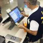 An employee counts U.S. dollar banknotes while completing a purchase at a Wal-Mart Stores Inc. location in Burbank, California, U.S., on Tuesday, Nov. 22, 2016. Consumer hardline retailers are hopeful Black Friday will provide a strong start to the holiday shopping season, but any lift may come at the expense of margins, as the landscape has become increasingly promotional. /COURTESY BLOOMBERG VIA GETTY IMAGES / PATRICK T. FALLON