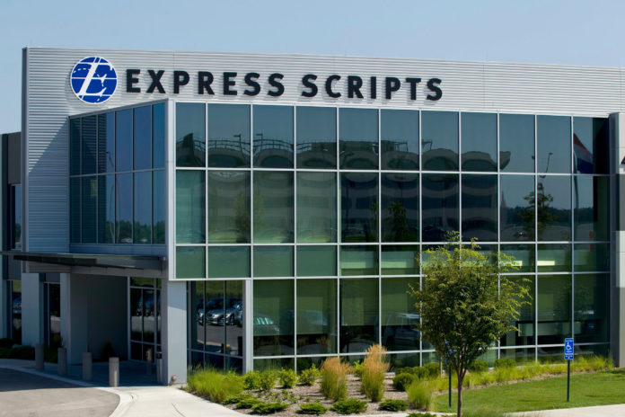 An Express Scripts building is seen in St. Louis, Missouri Thursday, July 21, 2011. Express Scripts and Medco Health Solutions, the largest U.S. pharmacy benefits management companies, said they will combine in a deal worth $29.1 billion in cash and stock. BLOOMBERG NEWS PHOTO/ WHITNEY CURTIS