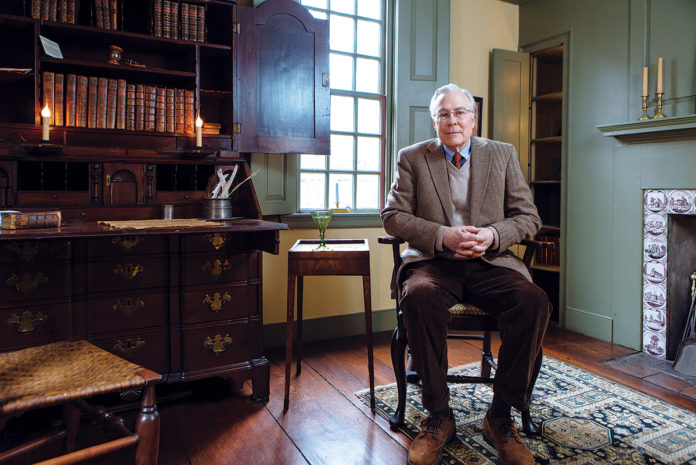 HISTORIC HOME: Ted Sanderson, the state’s historical-preservation officer, is photographed at The Stephen Hopkins House, which is owned by the state and has been operated by the National Society of Colonial Dames since 1927. Construction of the home began in 1707, with an addition in 1743 when R.I. Colonial Gov. Stephen Hopkins, a signer of the Declaration of Independence, resided there.