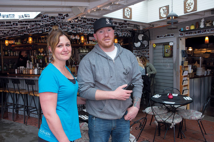 KEEPING TABS: Scott and Adrienne Kirmil own Diego’s Mexican Restaurant on Bowen’s Wharf in Newport. After he discovered a former employee had copied a key and was coming into the establishment at night, Scott decided to invest in Cox Business Security Solutions to keep tabs on their growing business. / PBN PHOTO/KATE WHITNEY LUCEY KEEPING TABS: Scott and Adrienne Kirmil own Diego’s Mexican Restaurant on Bowen’s Wharf in Newport. After he discovered a former employee had copied a key and was coming into the establishment at night, Scott decided to invest in Cox Business Security Solutions to keep tabs on their growing business. / PBN PHOTO/KATE WHITNEY LUCEY