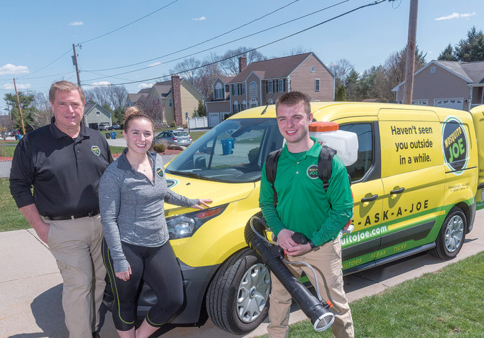 BUGS BE GONE: Bob Larence of Cumberland, owner of a Mosquito Joe franchise, with his son Brian and daughter Christa. / PBN PHOTO/MICHAEL SALERNO