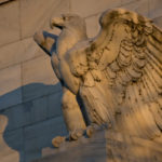 AN EAGLE sculpture stands on the facade of the Marriner S. Eccles Federal Reserve building in Washington, D.C./ BLOOMBERG NEWS PHOTO/ ANDREW HARRER