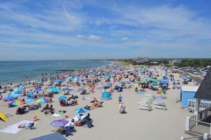 SUBEACHGOERS ARE SEEN at Roger Wheeler State Beach in Narragansett in July. State beaches open daily starting Saturday morning. / COURTESY OFFICE OF GOV. GINA M. RAIMONDON SPOT: Beachgoers are seen at Roger Wheeler State Beach in Narragansett in July. Officials from the R.I. Department of Environmental Management predict the number of visitors to the Ocean State's beaches will surpass last year's total of 1 million. / COURTESY OFFICE OF GOV. GINA M. RAIMONDO