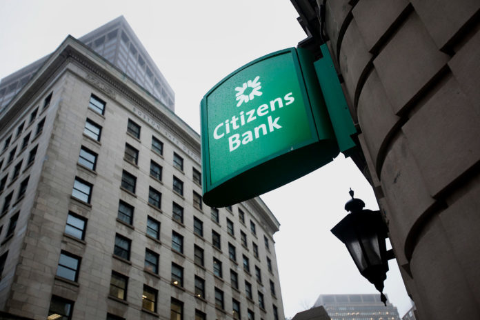 CITIZENS BANK is a wholly owned subsidiary of Providence-based Citizens Financial Group Inc. The bank posted net income of $1.7 billion in 2017, a 58.1 percent increase on its 2016 performance. / BLOOMBERG FILE PHOTO/KELVIN MA