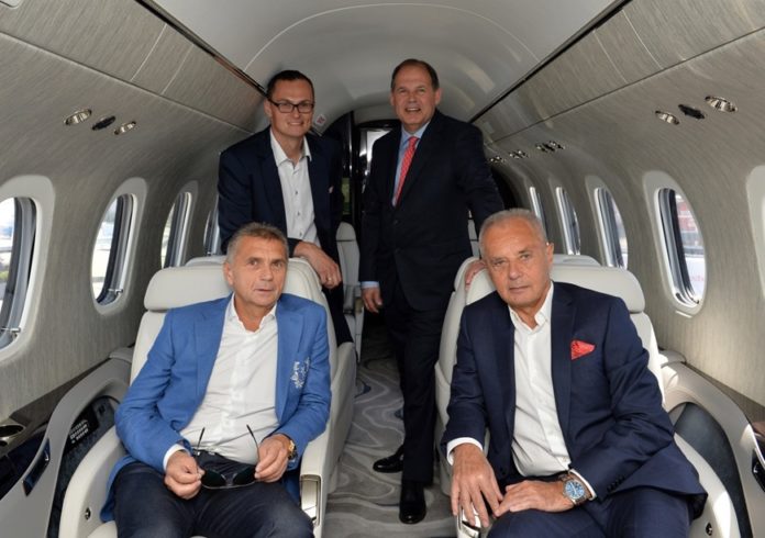 TEXTRON AVIATION EXPECTS to deliver the first Cessna Citation Longitude to the Czech airline Travel Service in 2018. From left to right: (front row) Roman Vik, Travel Service; Jiri Simane, Travel Service; (back row) Lukas Skyslak, Travel Service; Scott Ernest, Textron./COURTESY TEXTRON