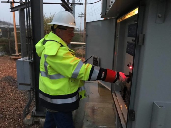 block island BLOCK ISLAND Power Co. line worker Jim Stockman closes the circuit breaker, re-energizing the substation. On Monday, the Block Island Power Co. shut down its diesel-generating plant to transfer the island’s electrical system to Deepwater Wind LLC’s Block Island Wind Farm and National Grid’s Sea2Shore submarine cable. / COURTESY BLOCK ISLAND POWER CO.