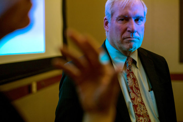 ERIC ROSENGREN, president of the Federal Reserve Bank of Boston, listens as an attendee speaks during the New York Association for Business Economics at the Harvard Club in New York,. Rosengren said that there is a great deal of uncertainty about fiscal policy, and that we are still in a risky time internationally. /BLOOMBERG ? MISHA FRIEDMAN