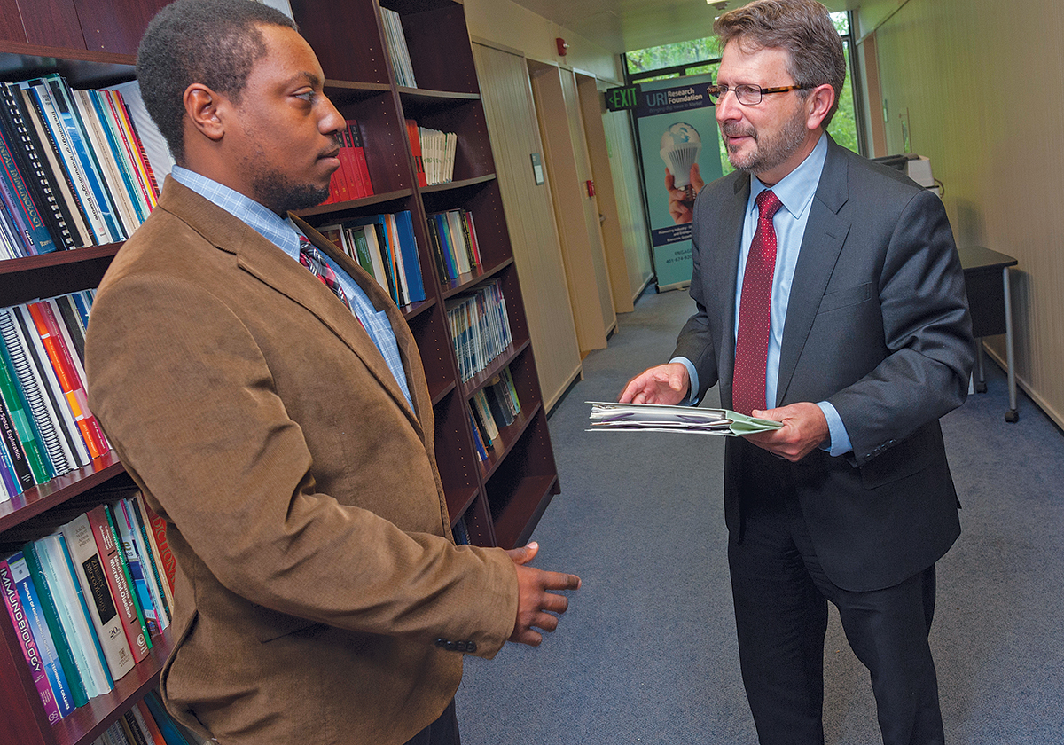 TECH TALK: Michael E. Katz, right, executive director of the URI Research Foundation, speaks with Andrew Grand-Pierre, licensing technology officer, URI Research Foundation. / PBN PHOTO/­MICHAEL SALERNO
