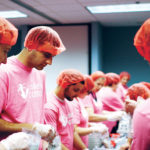 COMMUNITY CONNECTION: Collette staff packaged more than 30,000 meals during a meal packaging event in conjunction with Rise Against Hunger. / COURTESY COLLETTE