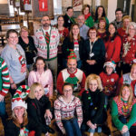 POSITIVELY RESPONSIVE: Healthcentrc Advisors staff demonstrate their flexibility, whether adapting to rapidly changing professional demands or celebrating a holiday party. / COURTESY HEALTHCENTRIC ADVISORS