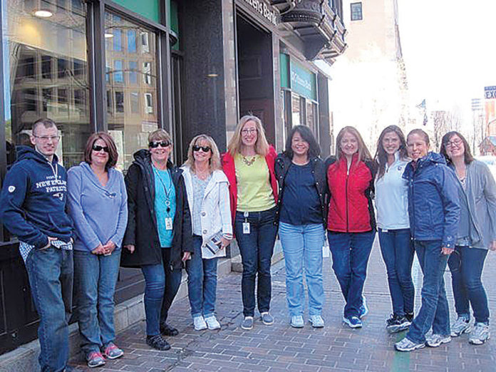 A HOLISTIC APPROACH: Hinckley, Allen & Snyder offers programing designed to help employees be as healthy as can be, including encouraging walking groups. / COURTESY HINCKLEY, ALLEN & SNYDER