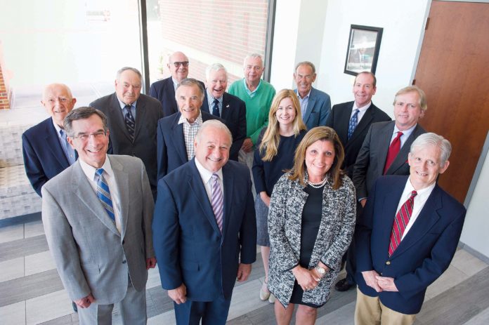 CLEAR PROGRESS: The board of the Narragansett Bay Commission takes a moment in 2016 to celebrate the opening of the new Water Quality Science Building. / COURTESY NARRAGANSETT BAY COMMISSION