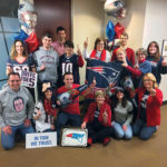 SOCIALLY ENGAGED: Wear Red Day 2017 coincided with the New England Patriots Super Bowl appearance, allowing Robinson+Cole staff to support a good cause and the winning team. / COURTESY ROBINSON+COLE