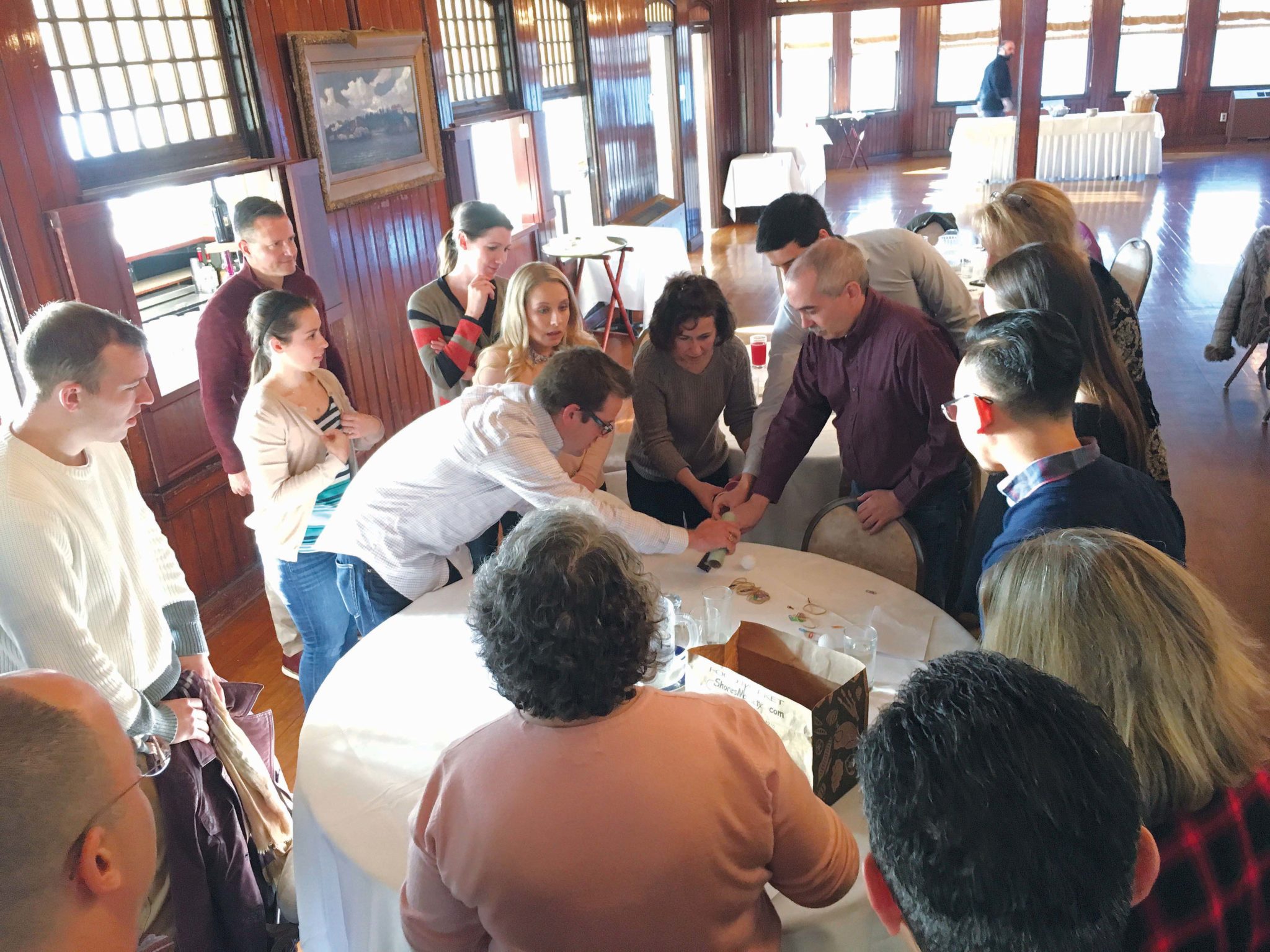 BUILDING A BETTER FIRM: Sansiveri, Kimball & Co. employees take part in team-building exercises during the company’s annual all-day retreat at the Squantum Club in East Providence. / COURTESY SANSIVERI, KIMBALL & CO.