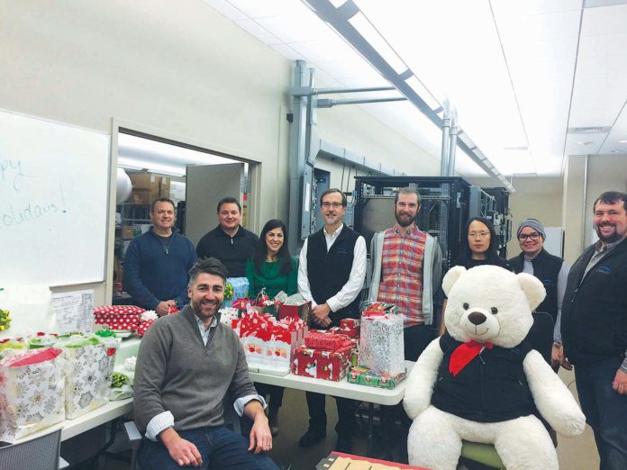 PITCHING IN TOGETHER: Utilidata supports Child & Family by adopting 12 teenage girls for the holidays and fulfilling their holiday wish lists. / COURTESY UTILIDATA