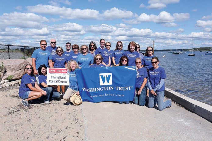 A CLEAN COMMUNITY: Washington Trust Co. employees participate every year in the International Coastal Cleanup; this group took part in September 2016 / COURTESY THE WASHINGTON TRUST CO.