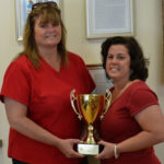 WELLONE'S PROGRAM coordinators, Lisa Schiffman, left, nurse care manager, and Nicole Masse, accept an award at a June 2 WISEWOMAN meeting. /COURTESY WELLONE